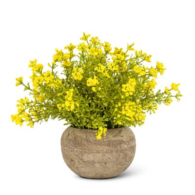 Pot couleur terre avec fleurs jaunes