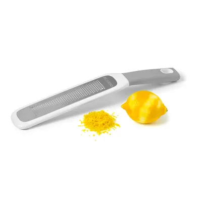 Fine grater with angled handle