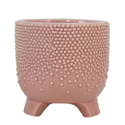 Pink pot on ceramic leg with dots