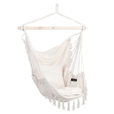 Cream hanging hammock chair with cushions