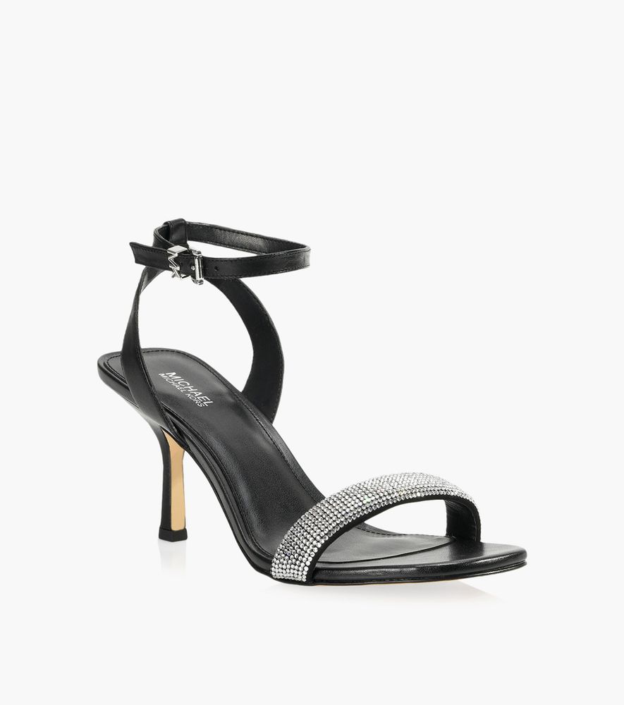 MICHAEL KORS CARRIE SANDAL - Black Leather + Synthetic | BrownsShoes