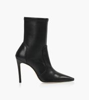 STUART WEITZMAN 100 STRETCH BOOTIE - Black Leather | BrownsShoes