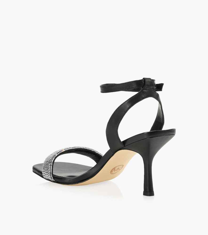 MICHAEL KORS CARRIE SANDAL - Black Leather + Synthetic | BrownsShoes