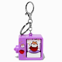 Moving Book Wind-Up Keychain