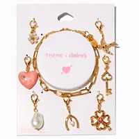 T H E M E x Claire's Gold-tone Lucky Charm Bracelet