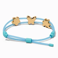 Gold-tone Clover, Flower & Butterfly Charm Blue Bolo Bracelet