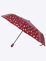 Compact color-changing umbrella with raindrop design by Up-Brella