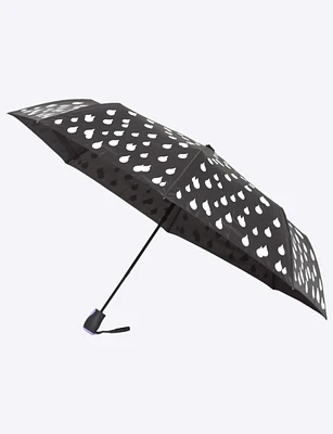 Compact color-changing umbrella with raindrop design by Up-Brella