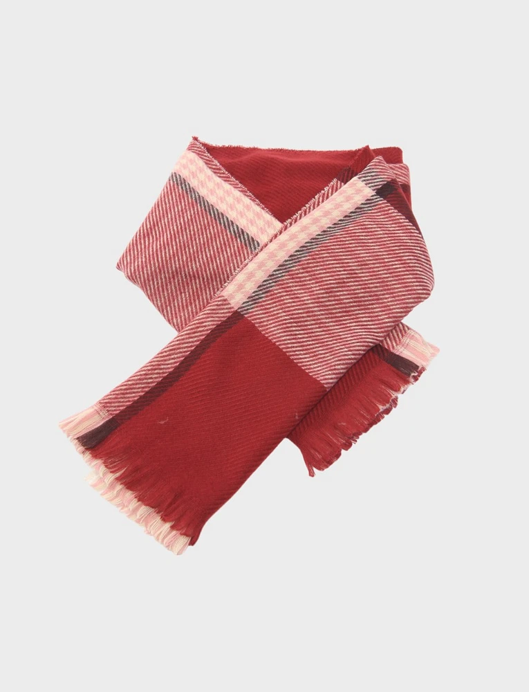 Sleek, warm woven scarf with a blend of solid and check patterns by Saki