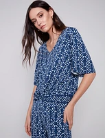 Knot-Front Geometric Print Three-Quarter Sleeve Top By Charlie B