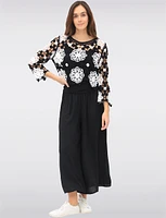 Delicate Black & White Floral Crochet Top With Long Sleeves by Gabby Isabella