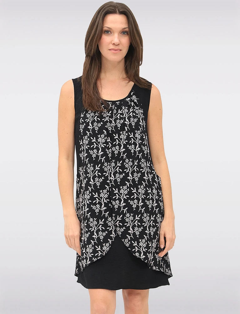 Versatile Black & White Sleeveless Dress with Printed Flowy Overlay by Devia