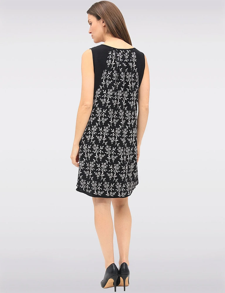 Versatile Black & White Sleeveless Dress with Printed Flowy Overlay by Devia
