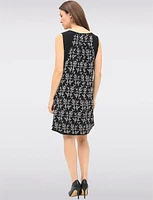 Versatile Black & White Sleeveless Dress with Printed Flowy Overlay by Devia