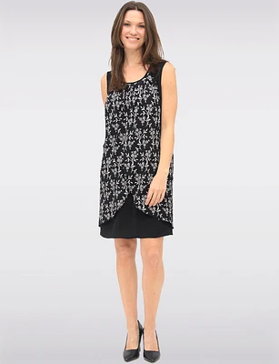 Versatile Black & White Sleeveless Dress with Printed Flowy Overlay by Devia