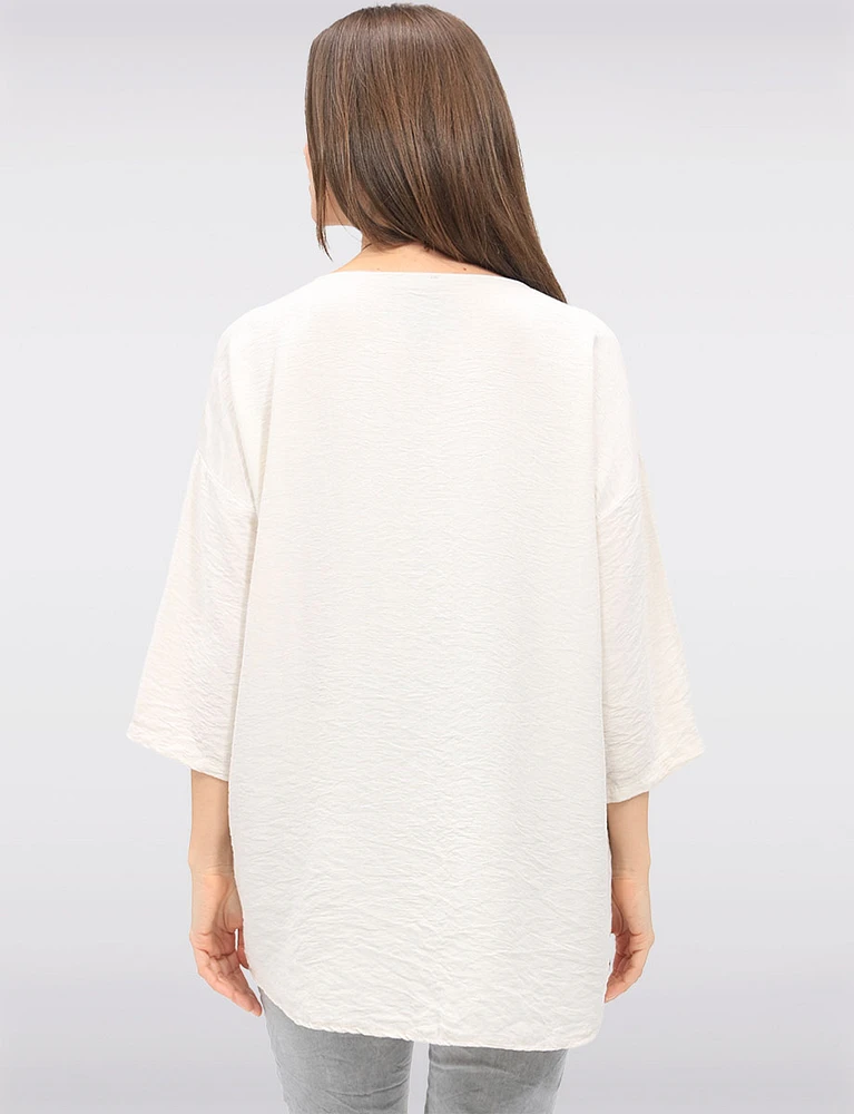 Flowy Round Neck Asymmetrical Hem Top with 3/4 Sleeves and Necklace by Froccella