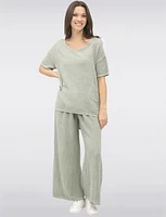 Breathable High-Low Linen Top with Stylish Button-Down Back Detail by Froccella