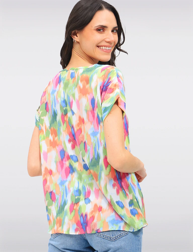Vibrant Multi-Colored Flowy Top With Cap Sleeves & Fold-Over Cuffs by Ninety