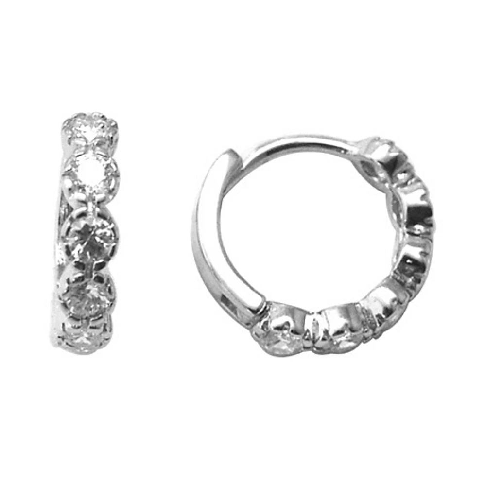 Sterling silver huggies style earrings set with cubic zirconia. Color: white | Doucet Latendresse