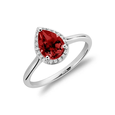 10K White Gold Pear-Shaped Ruby and Diamond Halo Ring. Color: white | Doucet Latendresse