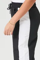 Women's Side-Striped Windbreaker Pants in Black/White Large