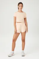 Women's Active Snap-Button Windbreaker Shorts in Pale Peach Large