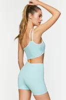 Women's Active Cutout One-Shoulder Romper in Powder Blue/White Large