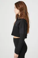 Women's Oversized Half-Button Crop Top in Black Large