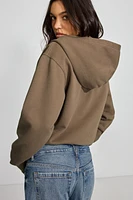 Haut à capuchon zippé emblématique en SoftTerry