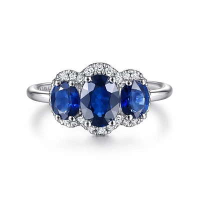 Gabriel & Co. - LR52023W45SA - 14K White Gold Diamond and Sapphire Oval Halo Three Stone Ring