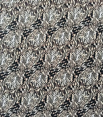 Abstract Animal Print on Cream Double Brush Knit Fabric