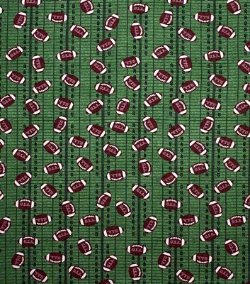 Footballs on Field Super Snuggle Flannel Fabric