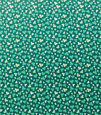 Shamrocks on Dark Green Jersey Knit Fabric by POP!