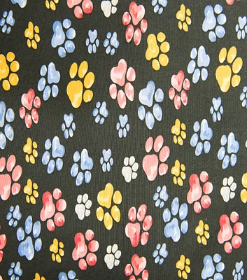 Orange/Blue/Red Paws On Black Novelty Cotton Fabric