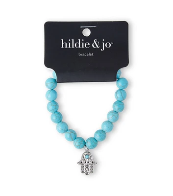 Turquoise & Silver Beaded Stretch Bracelet With Hamsa Charm by hildie & jo