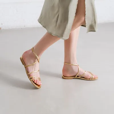 Flat strappy sandals and straps