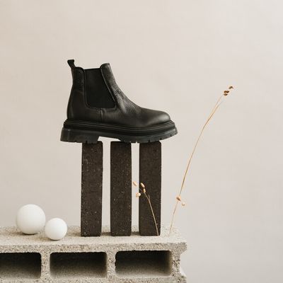 Ankle boots with notched sole
