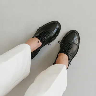 Loafers with laces and stitching