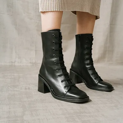 Heeled boots with laces