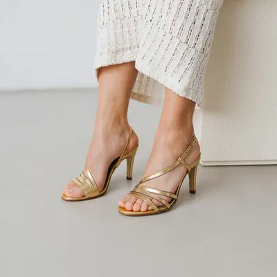 Heeled sandals with straps