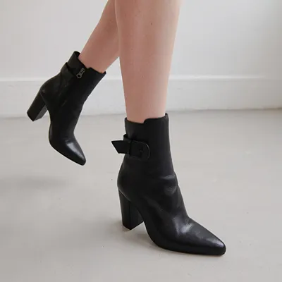 Pointed toe boots with buckles