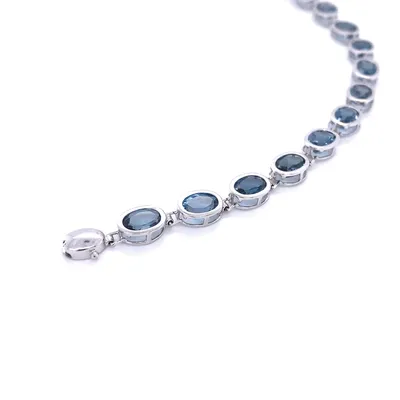 14 Karat White Gold Blue Topaz Bezel Bracelet