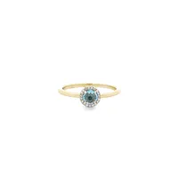 14 Karat Yellow Gold Blue Topaz Halo Ring