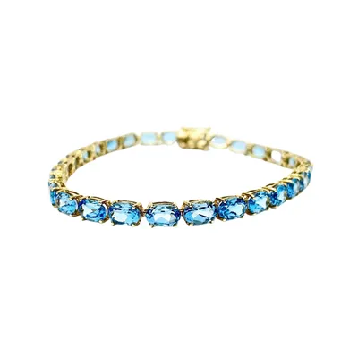 14 Karat Yellow Gold Blue Topaz Tennis Bracelet