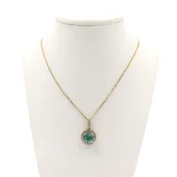 14 Karat Gold Emerald and Diamond Halo Necklace