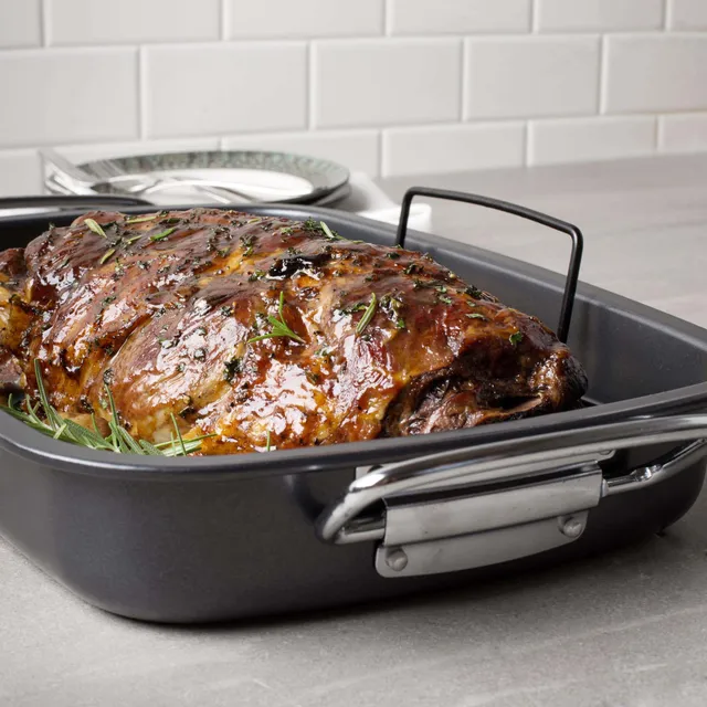 https://cdn.mall.adeptmind.ai/https%3A%2F%2Fwww.kitchenstuffplus.com%2Fmedia%2Fcatalog%2Fproduct%2F6%2F8%2F68393_KSP_Optimum_Non_Stick_Roaster_With_Rack_2.jpg%3Fwidth%3D2000%26height%3D%26canvas%3D2000%2C%26optimize%3Dhigh%26fit%3Dbounds_640x.webp