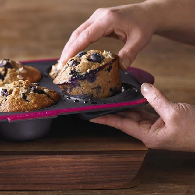 https://cdn.mall.adeptmind.ai/https%3A%2F%2Fwww.kitchenstuffplus.com%2Fmedia%2Fcatalog%2Fproduct%2F8%2F1%2F81774_Trudeau_Structure_Silicone_Muffin_Pan__Fuchsia_Grey_2.jpg%3Fwidth%3D2000%26height%3D%26canvas%3D2000%2C%26optimize%3Dhigh%26fit%3Dbounds_640x.webp