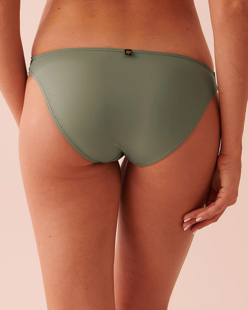 Bas de bikini côtés plissés en fibres recyclées SOLID