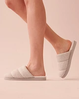 Pantoufles mules matelassées