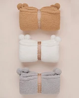 Couverture en sherpa à pompons